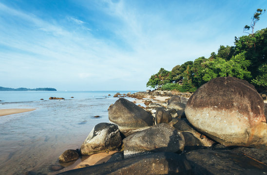 lonesome beach with big rocks