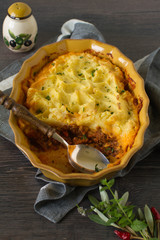 Classic homemade Shepherd's Pie in the casserole dish. Selective Focus.