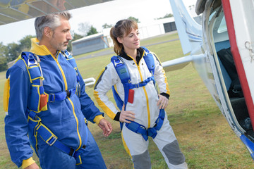 Parachuters about to board plane