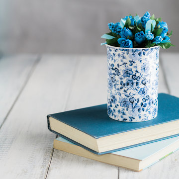 Cup on books