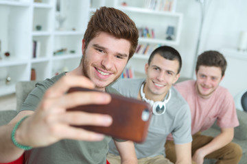 three boys taking a selfie