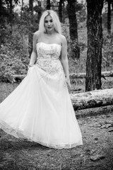 Romantic tender bride in a white dress in the forest. The concept of a wedding in a rustic style. Beauty of the bride in combination with forest and nature, wedding fashion and dress elements