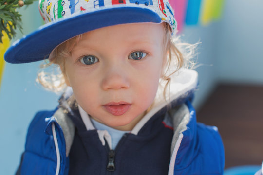 Adorable little boy with big blue eyes