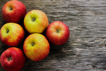Apples on the wooden table