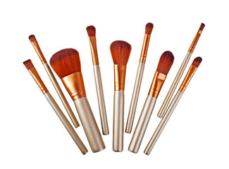 brown make-up brushes isolated on a white background