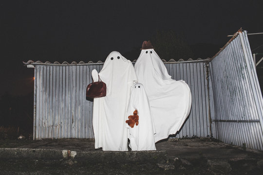 Happy family of ghosts