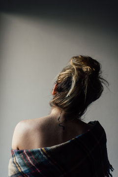 Back portrait of woman with tattoo