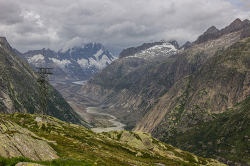 Fototapeta na wymiar Oberaar panoramic mountain road and glacier in Switzerland in Alps