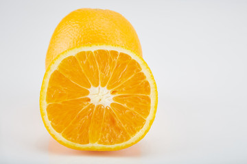 Cut orange. 