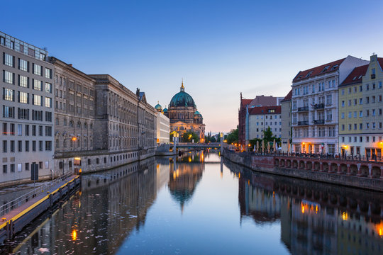 Architecture of Berlin reflected in Spree River, Germany
