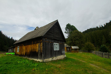old wooden house in mountains, forest house 