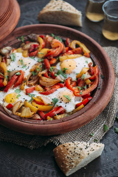 Food: Shakshuka with Bell Pepper, Onions and eggs in Tagine