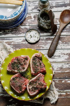 Minted lamb on table before cooking.