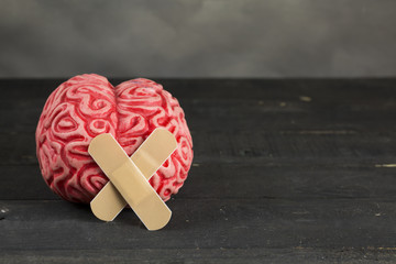 Plaster and Brain Mental Health Concept