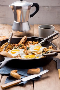 Spinach With Chickpeas And Fried Eggs