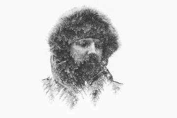 Double exposure portrait of man in fur hood