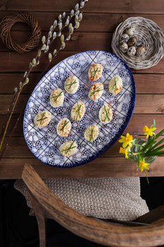 Deviled eggs on blue plate