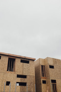 Incomplete condo buildings against sky