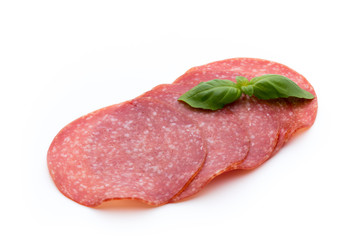 Salami slices isolated on white background.