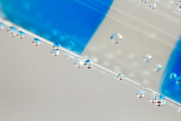 Abstract composition with underwater tubes with colorful jelly balls inside and bubbles
