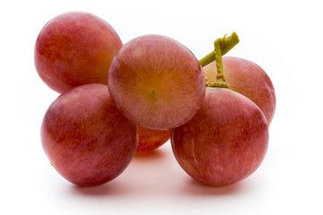 Ripe red grape isolated on white.