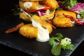 Breaded mozzarella cheese sticks.