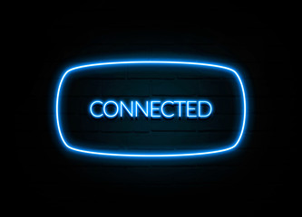 Connected  - colorful Neon Sign on brickwall