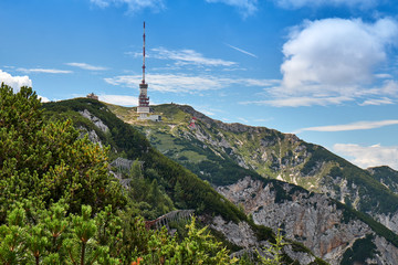 Radio tower and german chapel, Maria am Stein, on top of Dobratsch Gipfelkreuz in austrian region Kaernten near Villach