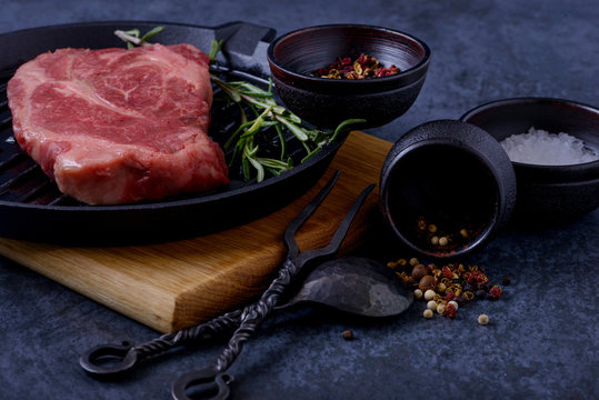 Raw meat beef steak on grill pan
