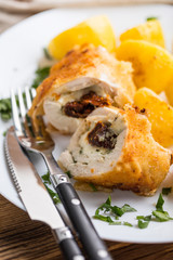 Chicken breast stuffed with cheese and dried tomatoes.
