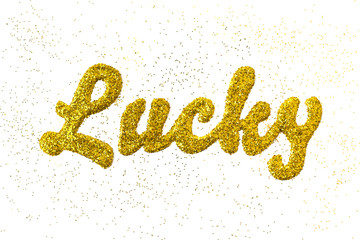 The word "lucky" spelled with gold glitter