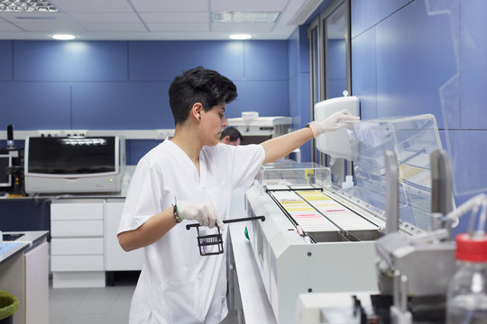 Lab technician working with molecular samples