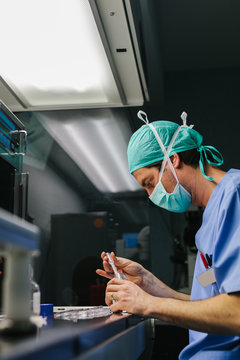 Young Man Working in a Professional Laboratory