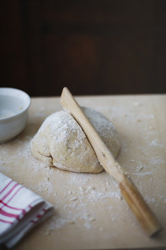 Gnocchi dedicated wooden knife on gnocchi dough