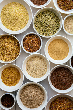 Various health seeds and grains arranged in bowls