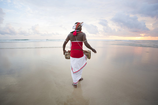 Kandyan Dancers with female tourists. Sri Lanka.