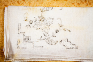 Fototapeta na wymiar Vintage textile texture with beautiful, fine embroidery 