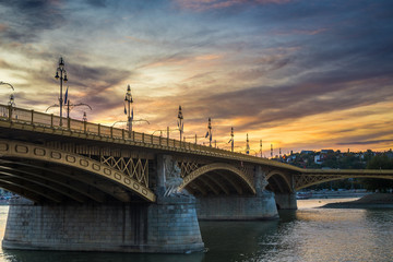 Fototapeta na wymiar Budapest, Hungary - The beautiful Margaret Bridge at sunset with amazing colorful sky