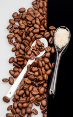 Coffee beans, brown sugar and small teaspoons
