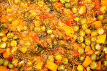 Stew with peas, carrots, onions, tomato sauce and spices

