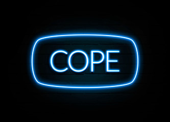 Cope  - colorful Neon Sign on brickwall