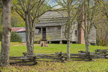 Rustic log cabin wood building structure homestead historic site texture background