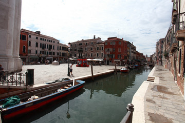venice, canal with various boats e