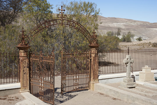 Historic British Cemetery from the era of nitrate mining in the Atacama Desert, in the grounds of Hacienda Tiliviche in northern Chile.