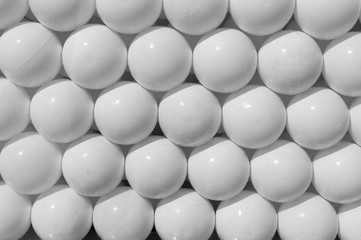 decorative white plastic balls. background, texture, concept.