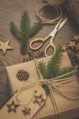 Christmas. Vintage style gift boxes on a rustic wooden table