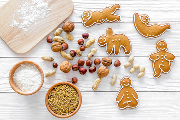Make gluten free healthy food. Yoga asanas cookies near desk, flour and wheat on white background top view copyspace
