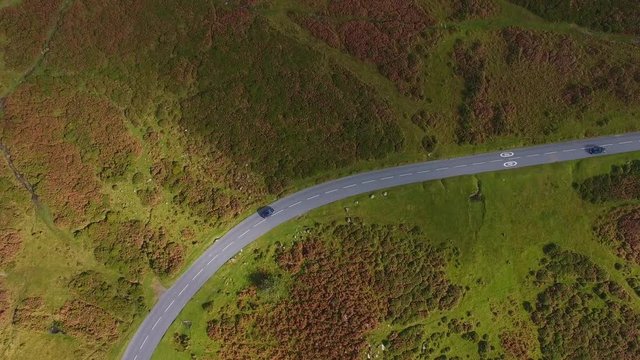 Car Driving on Scenic Highway through Beautiful Green Landscape, Aerial Drone Footage