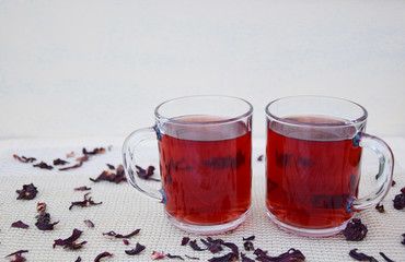 fresh hibiscus tea in glass mugs, roselle tea