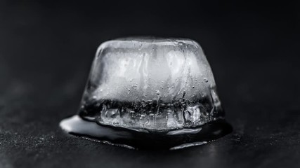Melting ice cubes in 4K UHD (close-up; timelapse footage) - Powered by Adobe